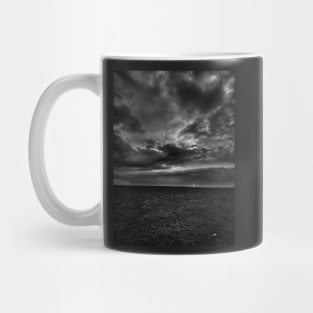 Stormy skies tiny lighthouse Mug